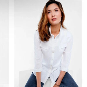 NZT long sleeved angled pocket shirt size small with repaired flaw​